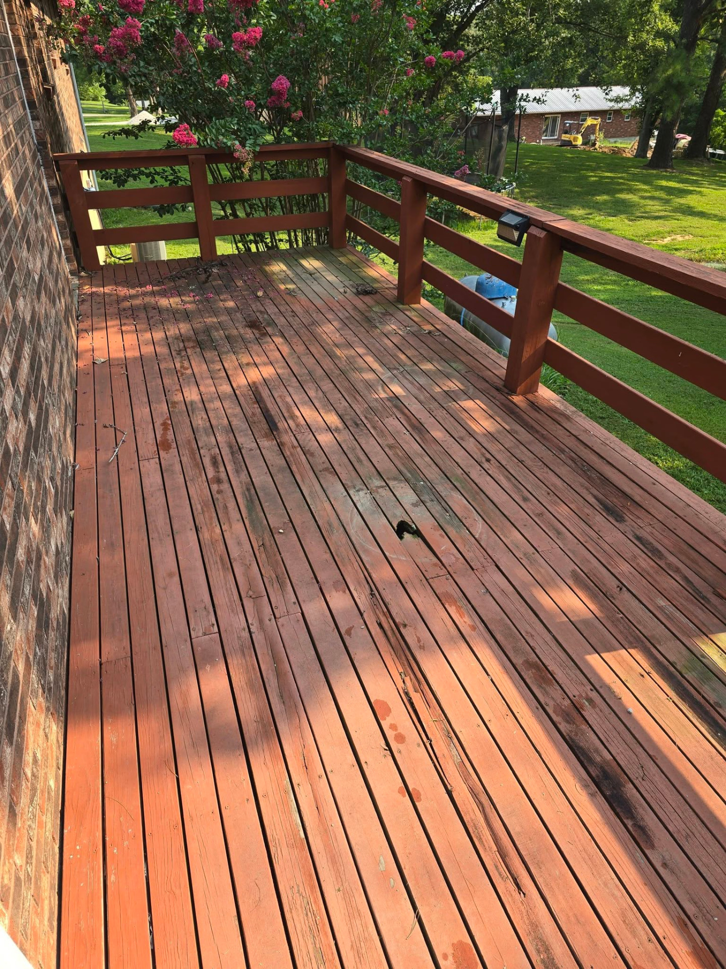 Original weathered wood deck before replacement by B&R Construction