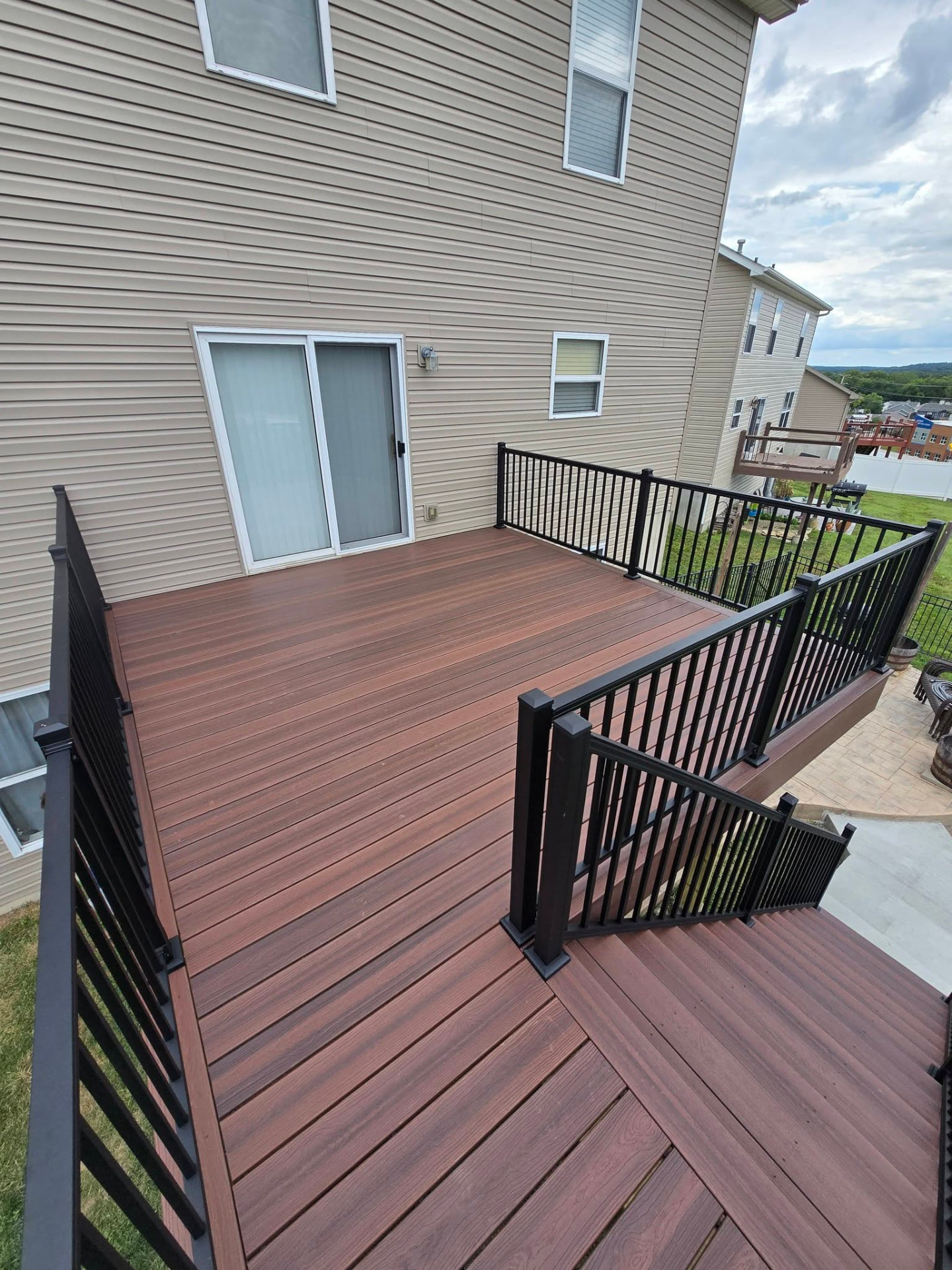 Complete demo and rebuild — 14' × 14' maintenance-free Envision Shaded Auburn composite deck by B&R Construction